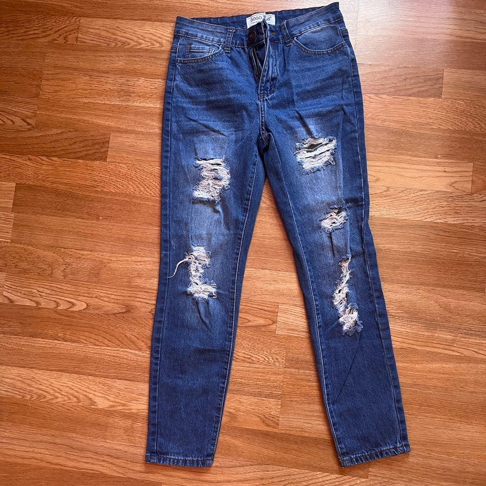 Distressed blue jeans